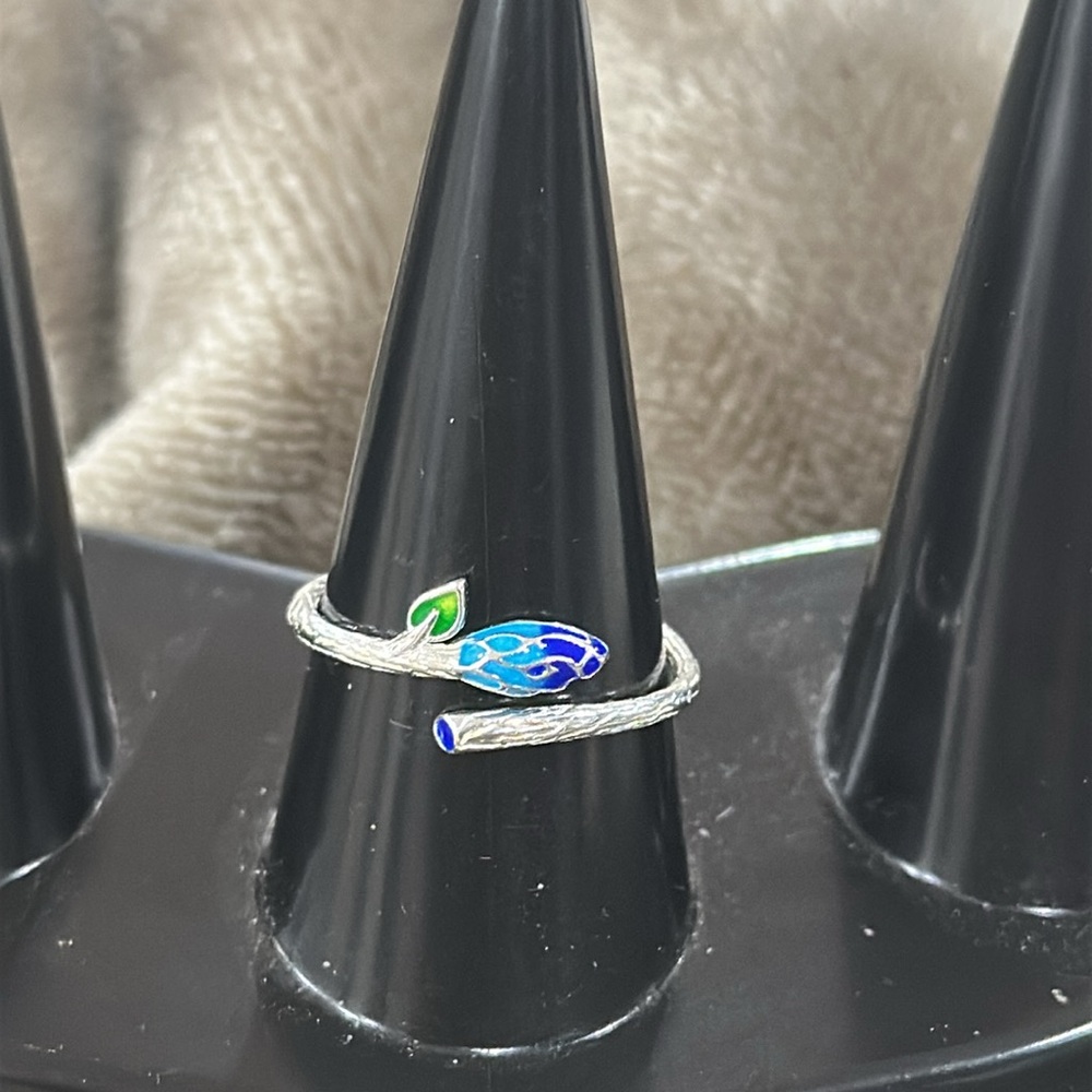 Silver ring with blue design